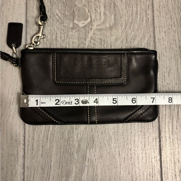 Coach wristlet in black leather. Hangtag present. EUC. - Picture 10 of 11